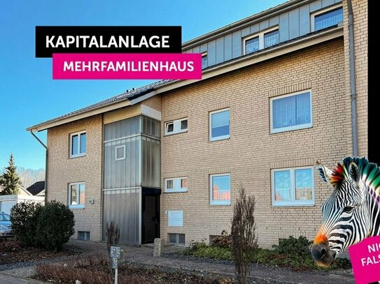 Kapitalanlageobjekt - Modernisiertes MFH mit 5 WE, Balkonen, Garagenhof, Garten