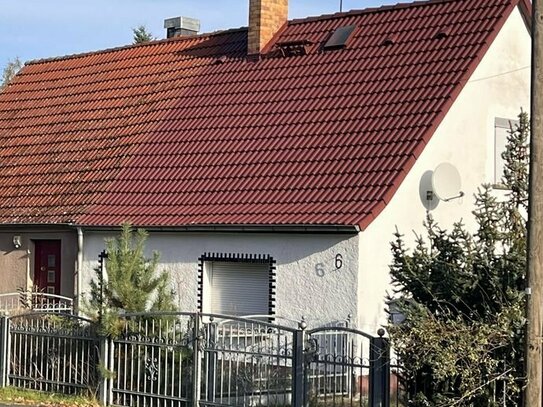 Sanierungsbedürftige Doppelhaushälfte sowie Bauerwartungsland in Am Mellensee OT Alexanderdorf zu verkaufen