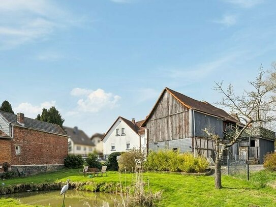 Einfamilienhaus mit zusätzlicher Mieteinnahme und tollem Garten