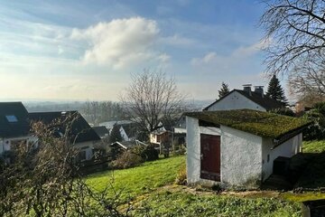 **Baugrundstück in bevorzugter Wohnlage mit Baugenehmigung für 6-Fam.-Haus**