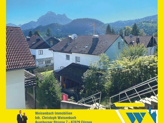 Solide vermietete Doppelhaushälfte in Toplage mit schönem Blick