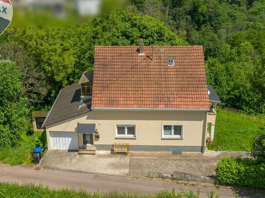 Familienfreundliches Einfamilienhaus mit großem Grundstück und moderner Ausstattung in Taben-Rodt