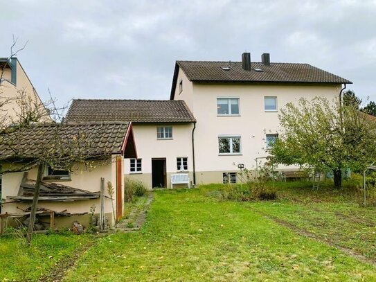 Mehrfamilienhaus mit Baugrundstück in Freiburg-Tiengen