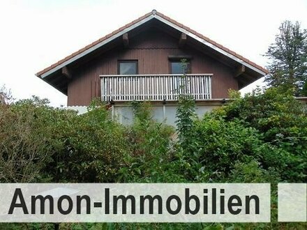 Schmuckes Einfamilienhaus mit Wintergarten, Balkon und Garage in ländlicher Lage.