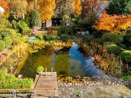 EXKLUSIVES WOHNEN mit Wasserblick auf 960 qm Sonnengrundstück- dicht am Park