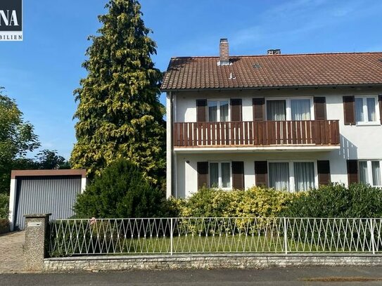 Doppelhaushälfte mit Charme! Zwei Wohneinheiten in ruhiger Lage mit pflegeleichtem Garten