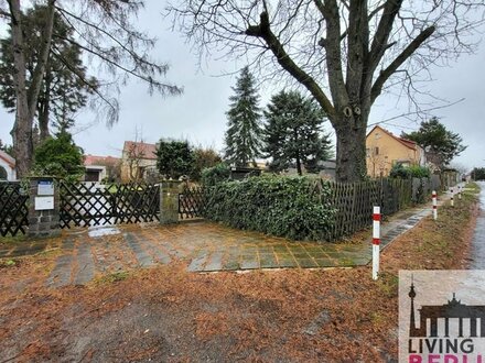 EINFAMILIENHAUS IN RUHIGER LAGE MIT POTENZIAL ZUR SANIERUNG ODER ABRISS UND NEUBAU!