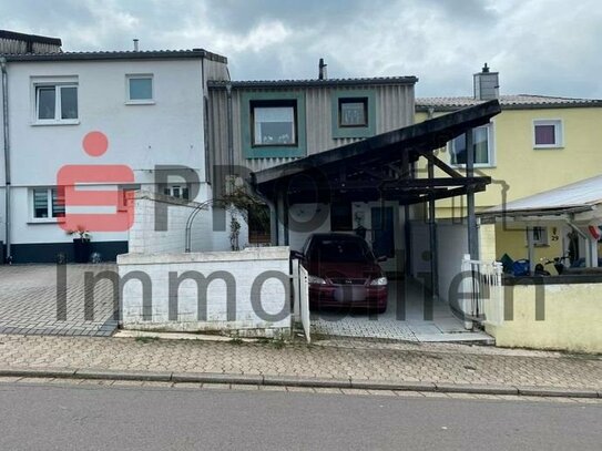 Einfamilienhaus mit überdachtem Stellplatz und Garten!