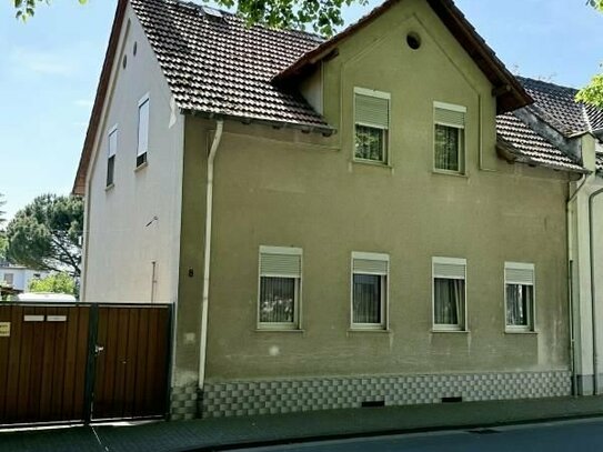 Charmantes Ein-Zweifamilienhaus aus der Jahrhundertwende mitten in Hattersheim