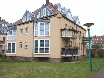 Vermietete 1-Zimmer-Erdgeschosswohnung mit Terrasse und Tiefgaragenstellplatz in ruhiger Wohnlage