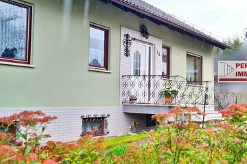 Geräumiges Einfamilienhaus mit Garten in Langenbrombach