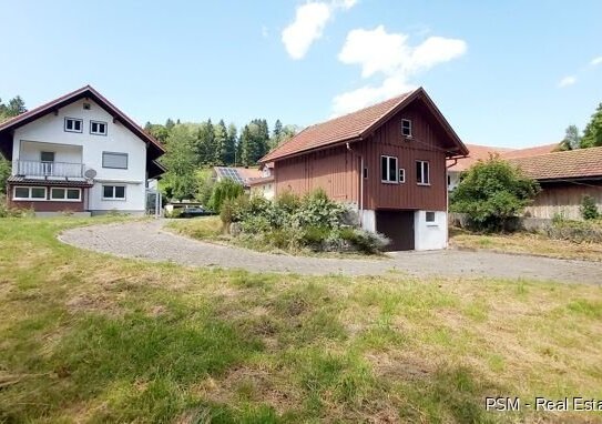 **Projektiertes Grundstück mit ein 2 Familienhaus und Baugenehmigung für ein MFH mit 10 Wohnungen**