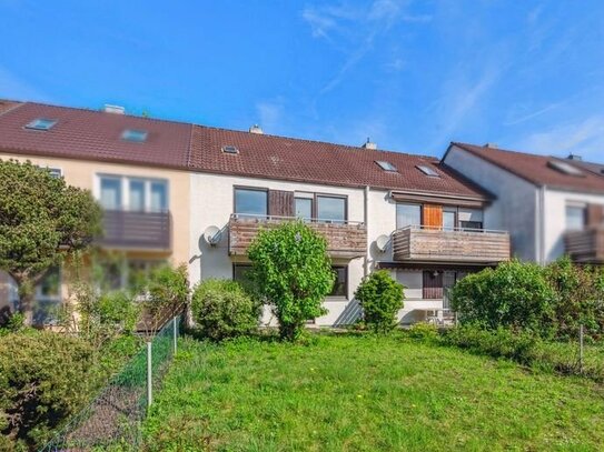 Modernisierungsbedürftiges Reihenmittelhaus mit sonnigem Garten in Heimstetten-Kirchheim bei München