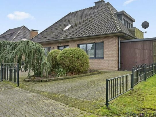 ***STEGEHUIS GMBH*** Charmantes Ein- Zweifamilienhaus mit großem Garten in Haren-Erika