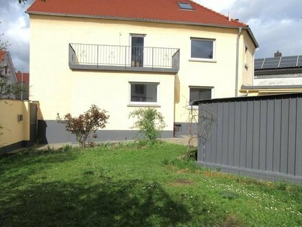 EFH mit Gewerbe, Garten und Garage. Neubebauung eines Mehrfamilienhauses möglich!