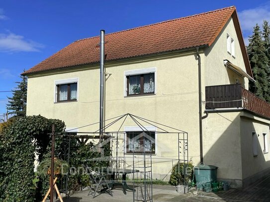 Einfamilienhaus mit Nebengelass auf großem Grundstück in ruhiger Lage!