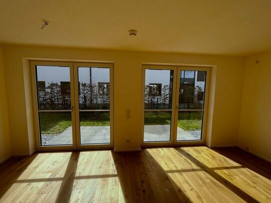 Modernes Wohnen im Grünen: Wohnung mit sonniger Terrasse in Taufkirchen