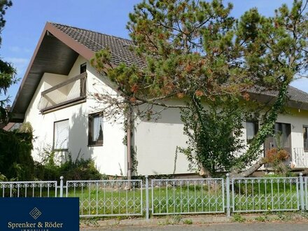 Einfamilienhaus mit Garage auf großem Grundstück in Bad Krozingen