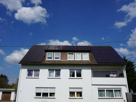 Mehrfamilienhaus mit anliegender Gewerbeeinheit und Garagenanlage!