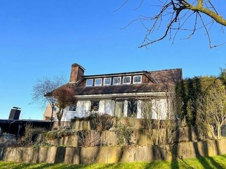 Ihr Einfamilienhaus mit Einliegerwohnung, auf wunderschönem Gartengrundstück in Hanglage!