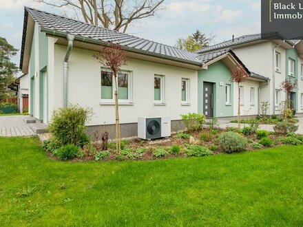 Zwei Häuser, ein Grundstück: Bungalow und Stadthaus in Eggersdorf bei Berlin bieten Wohnvielfalt