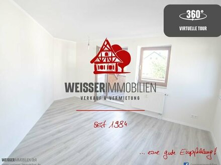 Helle und freundliche 3,5-Zimmermaisonette mit Loggia und Garage