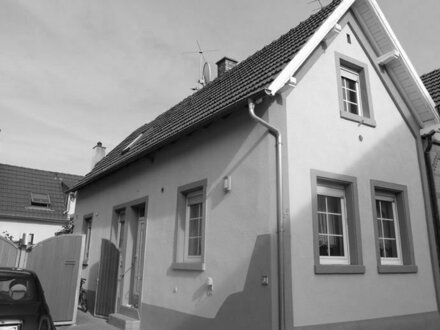 Idyllisches Zuhause: Gemütliches Haus mit Einliegerwohnung im Anbau und traumhaftem Garten!