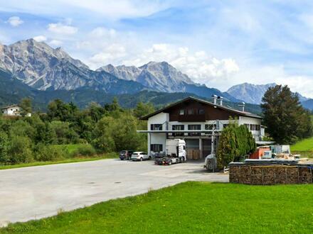 Betriebs-/Gewerbeliegenschaft mit Einliegerwohnung in zentraler Lage von Saalfelden