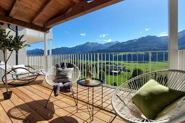 WEITBLICK W8: Dachgeschosswohnung in Sonnenhanglage mit unverbautem Panoramablick und großem Balkon