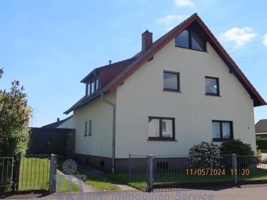 Homburg - Attraktives 1- bis 2-Familienhaus in schöner Stadtrandlage mit parkähnlichem Grundstück