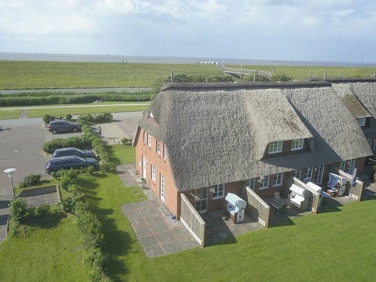 Nordstrand - Festpreis! Ferienhaus unter Reet direkt am Nordseedeich.