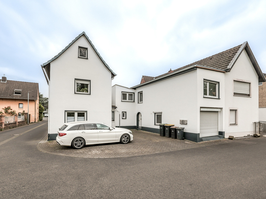 Sankt Augustin - Vermietetes Zweifamilienhaus mit separatem Gartengrundstück in Birlinghoven