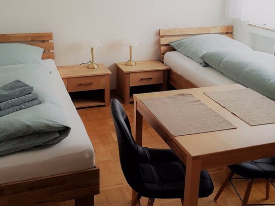 Guest rooms in Filderstadt with Internet, TV, guest kitchen, shower, guest WC, washing machine, ...