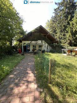 Gartenparadies mit idyllischem, finnischem Holzhaus wird zum Kauf angeboten - Perfekt für Familien und Ruhesuchende!