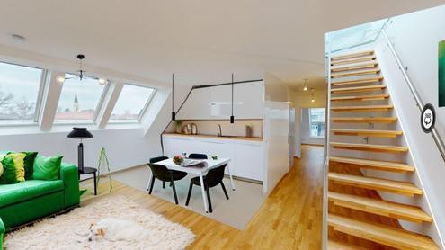 Helle Erstbezugsdachgeschoß-wohnung mit 60m² Dachterrasse - inkl. Garagenplatz in Zentrumsnähe