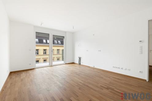 ERSTBEZUG mit ca. 7 m² BALKON | 2-Zimmer Neubau | Fernwärme | TG-Stellplatz optional | Nachhaltiges Wohnbauprojekt