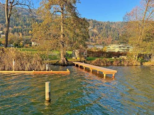 Sonnige Gartenwohnung mit privatem Seezugang