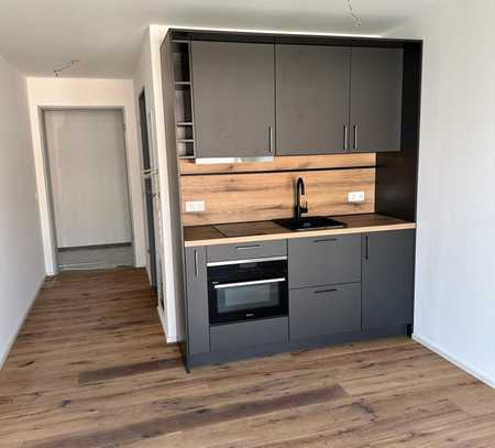 Luxuriöses Neubau-Apartment mit Einbauküche und Balkon