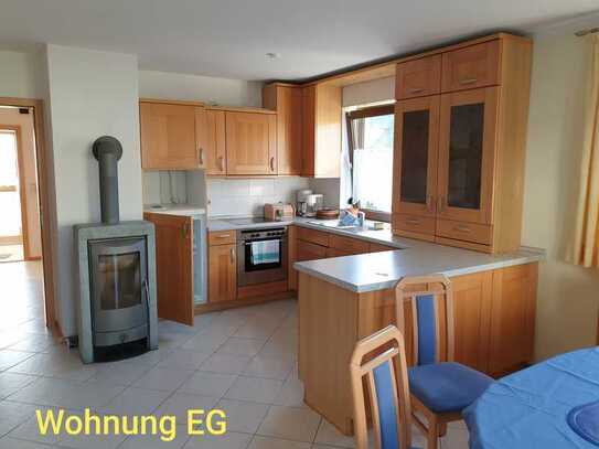 Geschmackvolle, gepflegte 4-Raum-Hochparterre-Wohnung mit Balkon und Einbauküche in Kissing