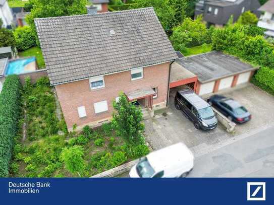 Attraktives Einfamilienhaus mit Potenzial zum Zweifamilienhaus, schönem Garten und Garage!