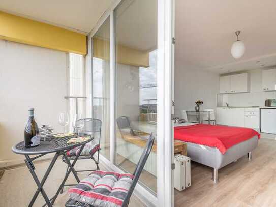 Lichtdurchflutetes Apartment mit großem Westbalkon und Alpenblick in Toplage Schwabing