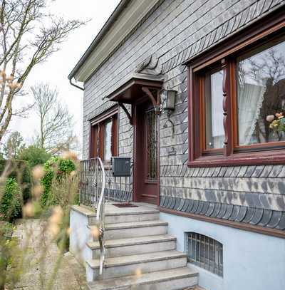 Bürgerliches Einfamilienhaus mit großzügigem Baugrundstück