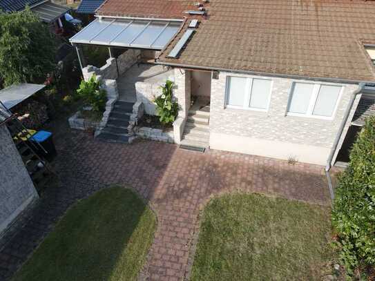 Charmantes Einfamilienhaus mit großem Garten und Carport in ruhiger Lage