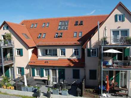 Exklusive 2,5 Zi-Wohnung mit großer Terrasse und Garten in ruhiger Südlage