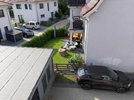 Moderne 4-Zimmer-Wohnung mit Terrasse und Garten