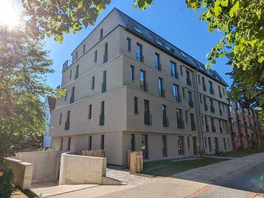 Moderne 3.-Whg. zzgl. offener Wohnküche mit großem Balkon im DG (KfW-Effizienzhaus 40 Plus)