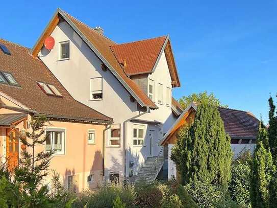 Attraktive und familienfreundliche 4-Zimmer-Wohnung in ruhiger Lage mit eigenem Garten und Garage