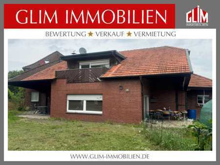 EIN-ZWEIFAMILIENHAUS MIT GARAGE UND STELLPLÄTZEN IN OELDE