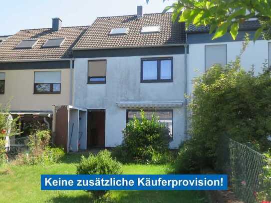 Sanierungsbedürftiges Reihenmittelhaus mit Garten und Garage in ruhiger Wohnlage