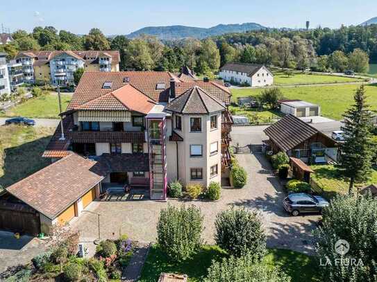 Solides Mehrfamilienhaus mit Baugrundstück und allen Möglichkeiten in bester Lage von Murg